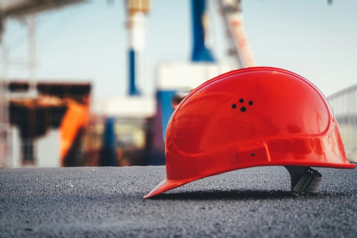 Red hardhat on construction site