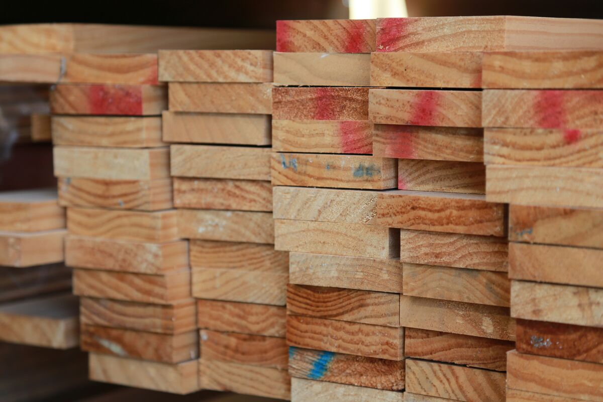 Stacked dimensional lumber boards